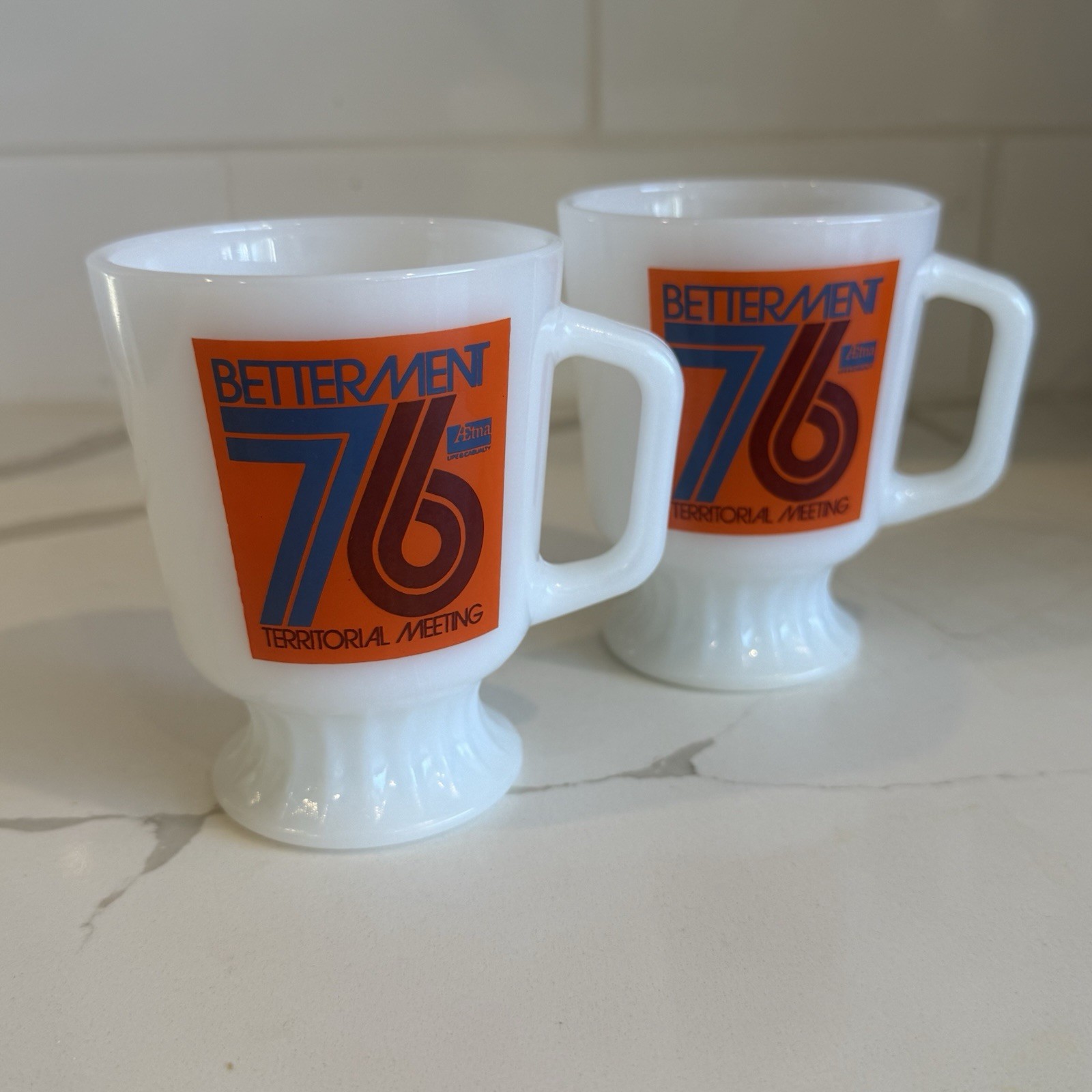 2 Vintage Fire King Anchor Hocking Footed Milk Glass Cup Mug Aetna Betterment 76