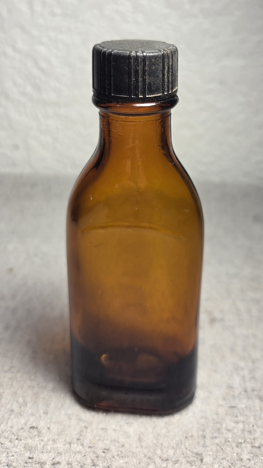 4-ounce pharmacy prescription bottle amber glass antique with bakelite cap