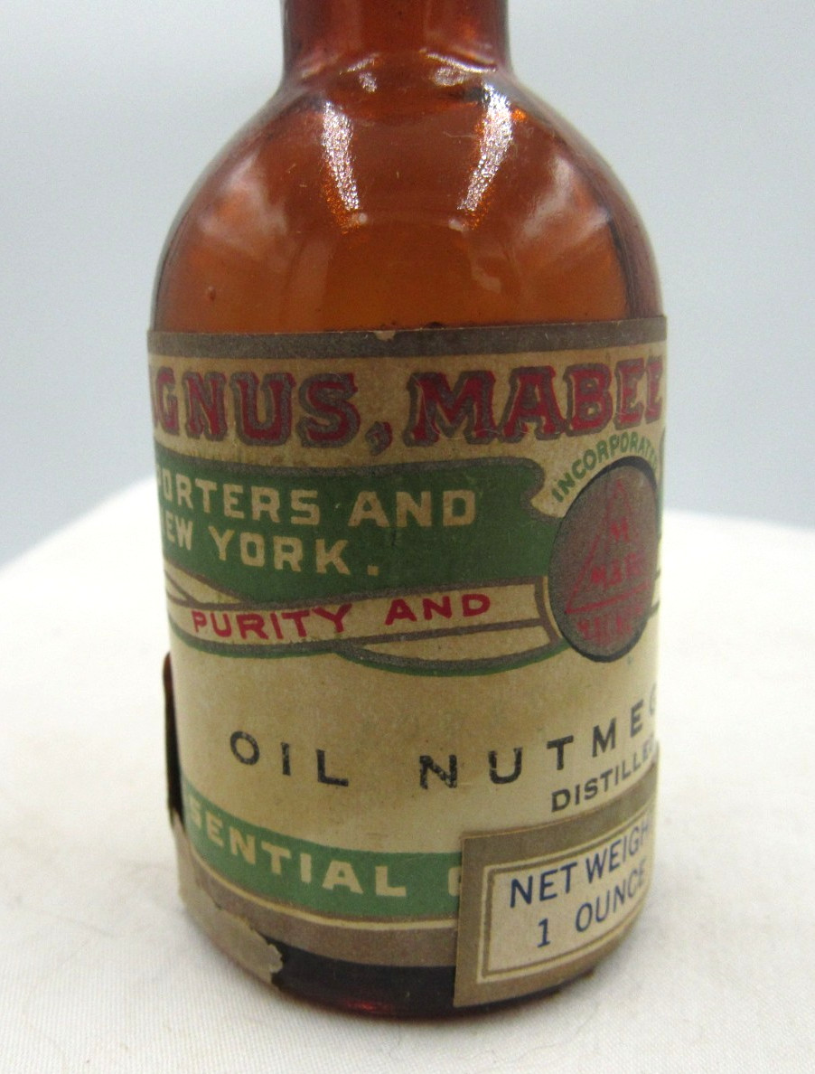 BW – 1920’s Magnus, Mabee & Reynard Oil of Nutmeg 3 1/4 ” Amber Medicine bottle