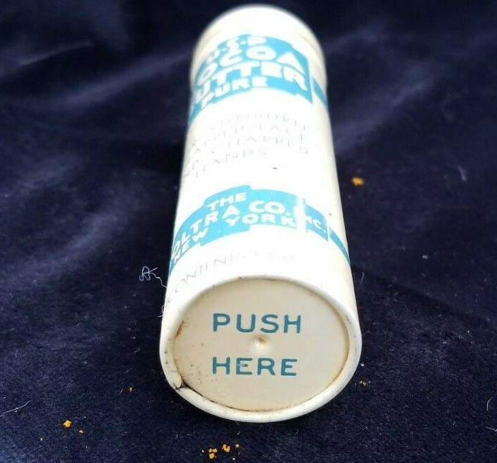 Old Advertising Medicine Tin USP Pure Cocoa Butter Woltra Co NY Push Dispenser