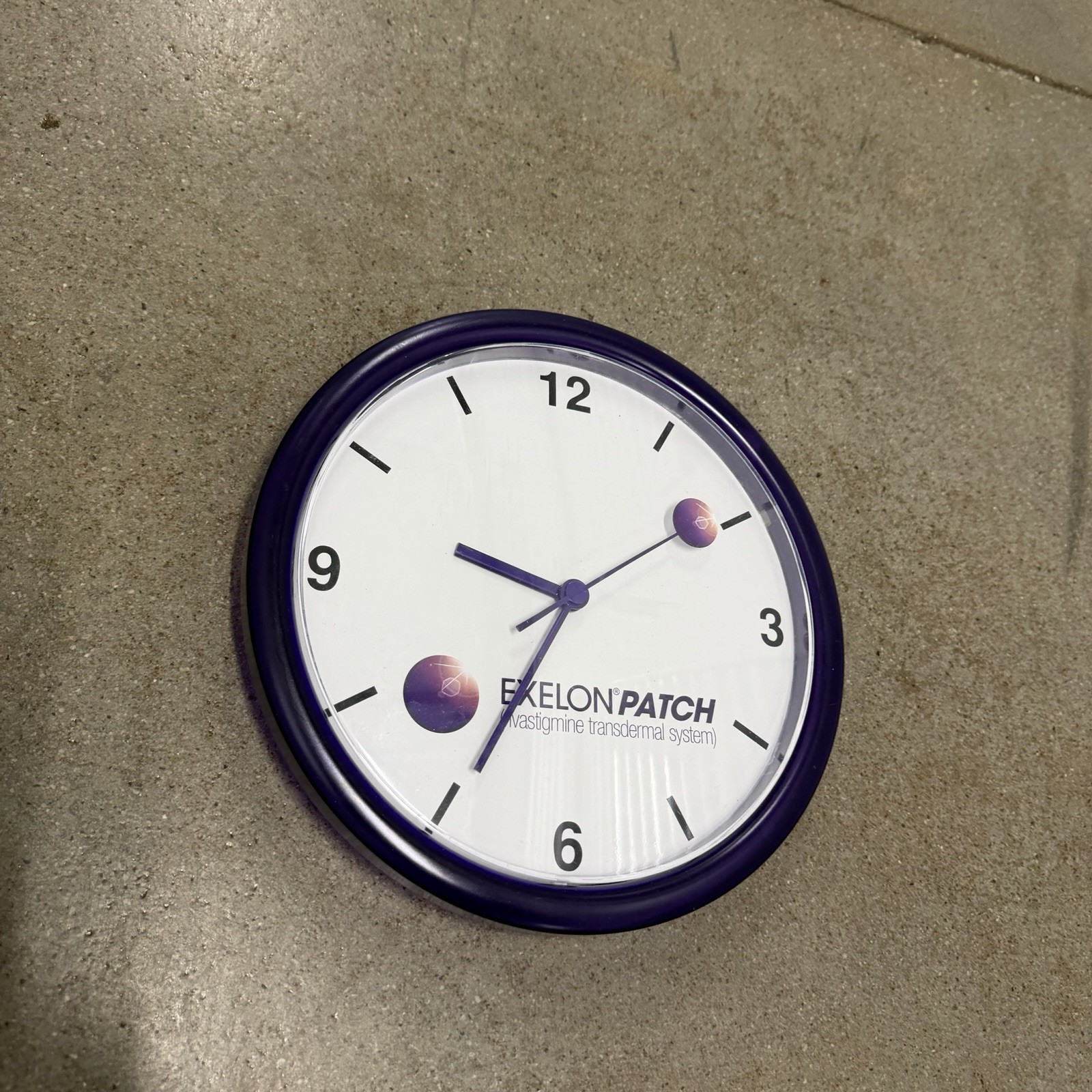 Exelon Patch Pharmaceutical Advertising Purple Wall Clock 10″ Plastic