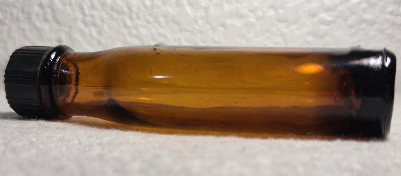 4-ounce pharmacy prescription bottle amber glass antique with bakelite cap