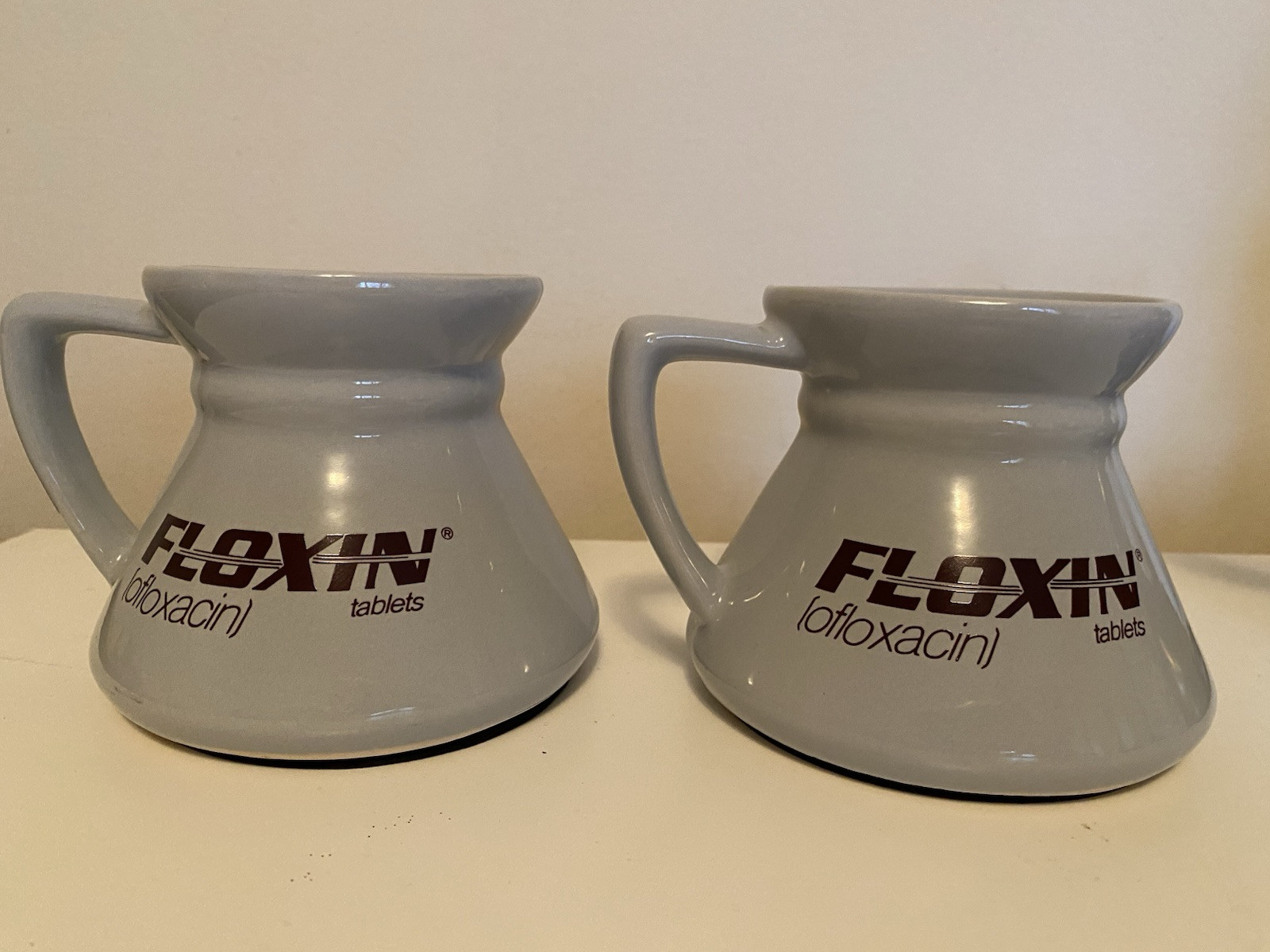 Drug rep Floxin 2 ceramic mugs, paperweight thermometer, canvas laptop bag