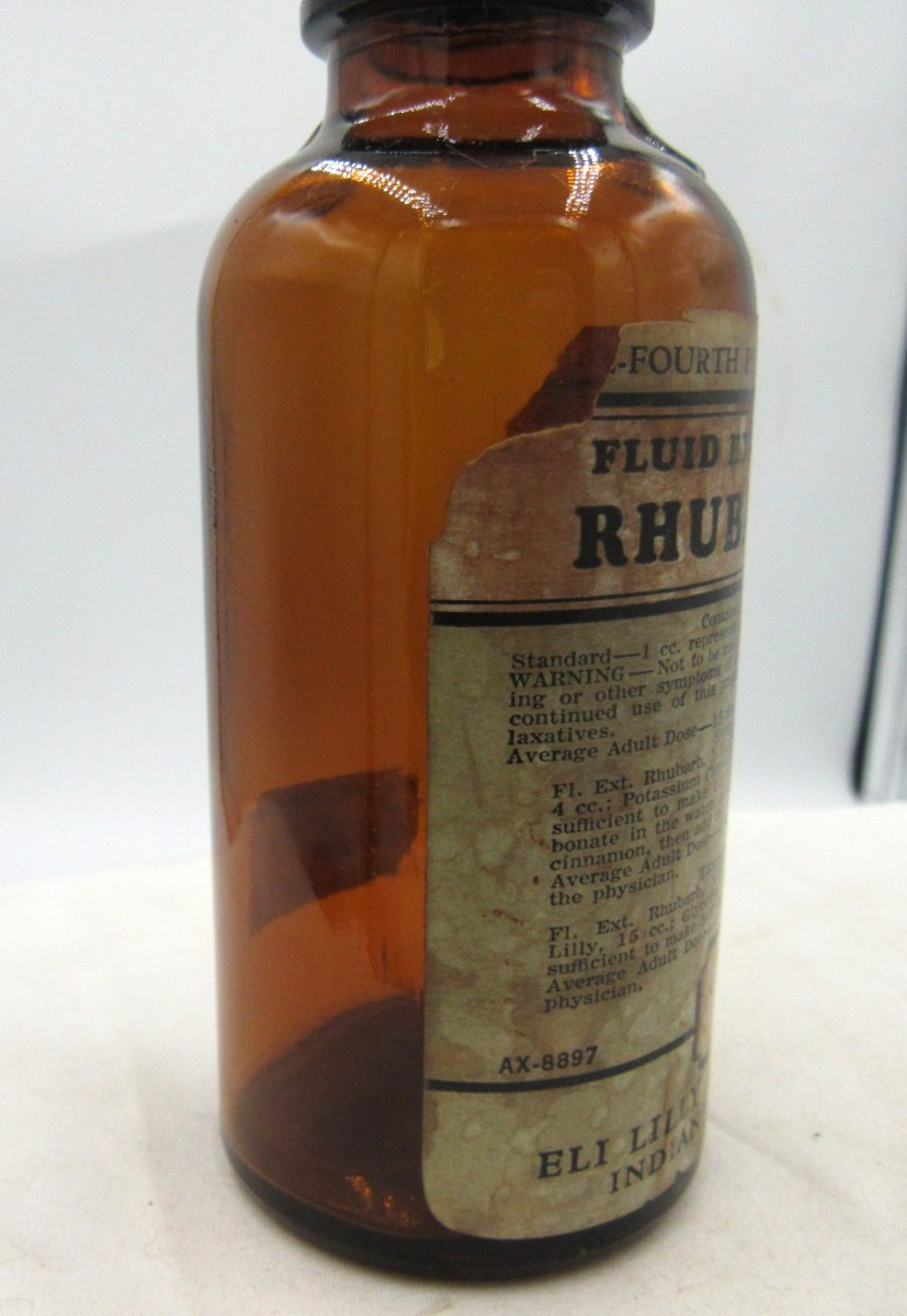 BW – 1940’s Eli Lilly Rhubarb Indianapolis Ind 5 1/4″ Amber Medicine bottle
