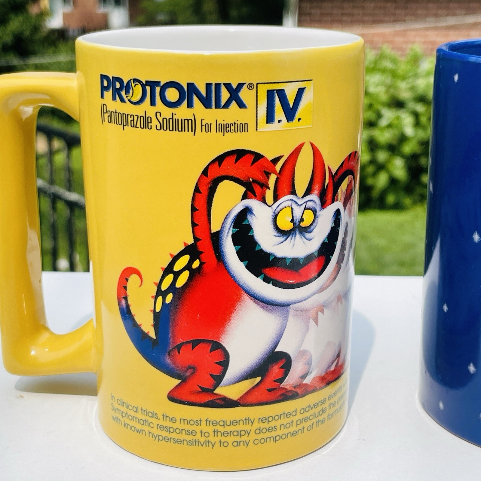 Lot Of 2 Protonix Coffee Mugs Heartburn Monster Pharmaceutical Advertisement
