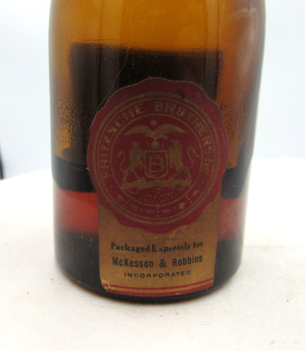 MM – 1940’s Fritzsche Bros NY Oil of Pennyroyal 4 1/2″ Amber Medicine bottle