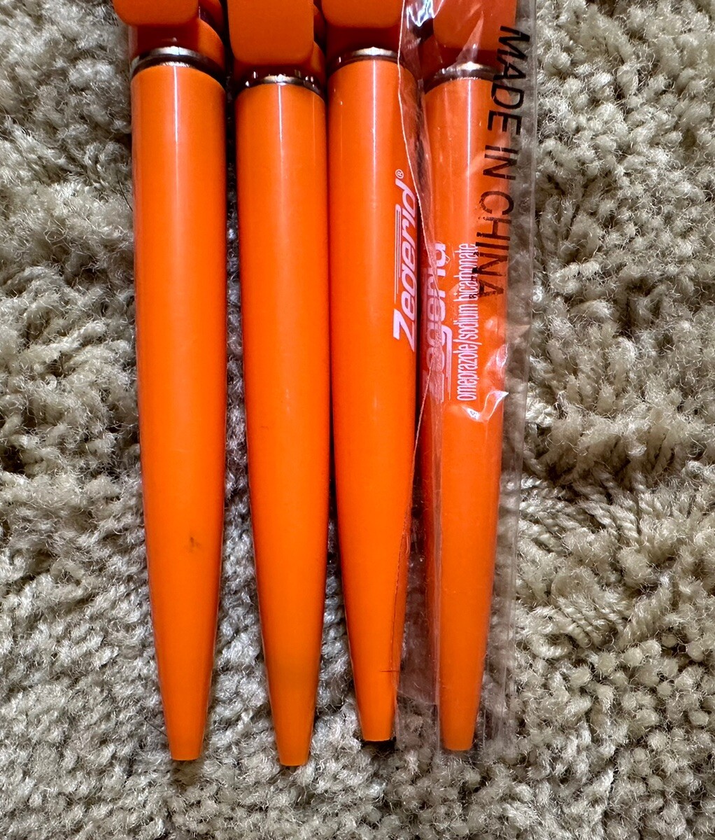 Orange Zegerid Drug Rep Pharmaceutical Promo Pens Spring Coil Clicker Lot of 4