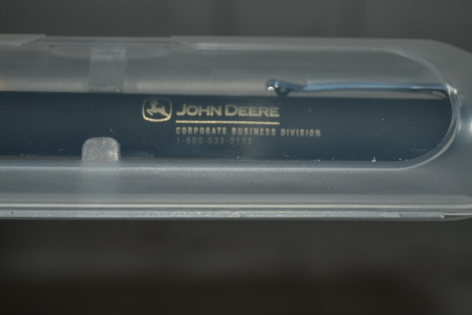 John Deere Corporate Business Division Promotional Laser Pointer Advertisement