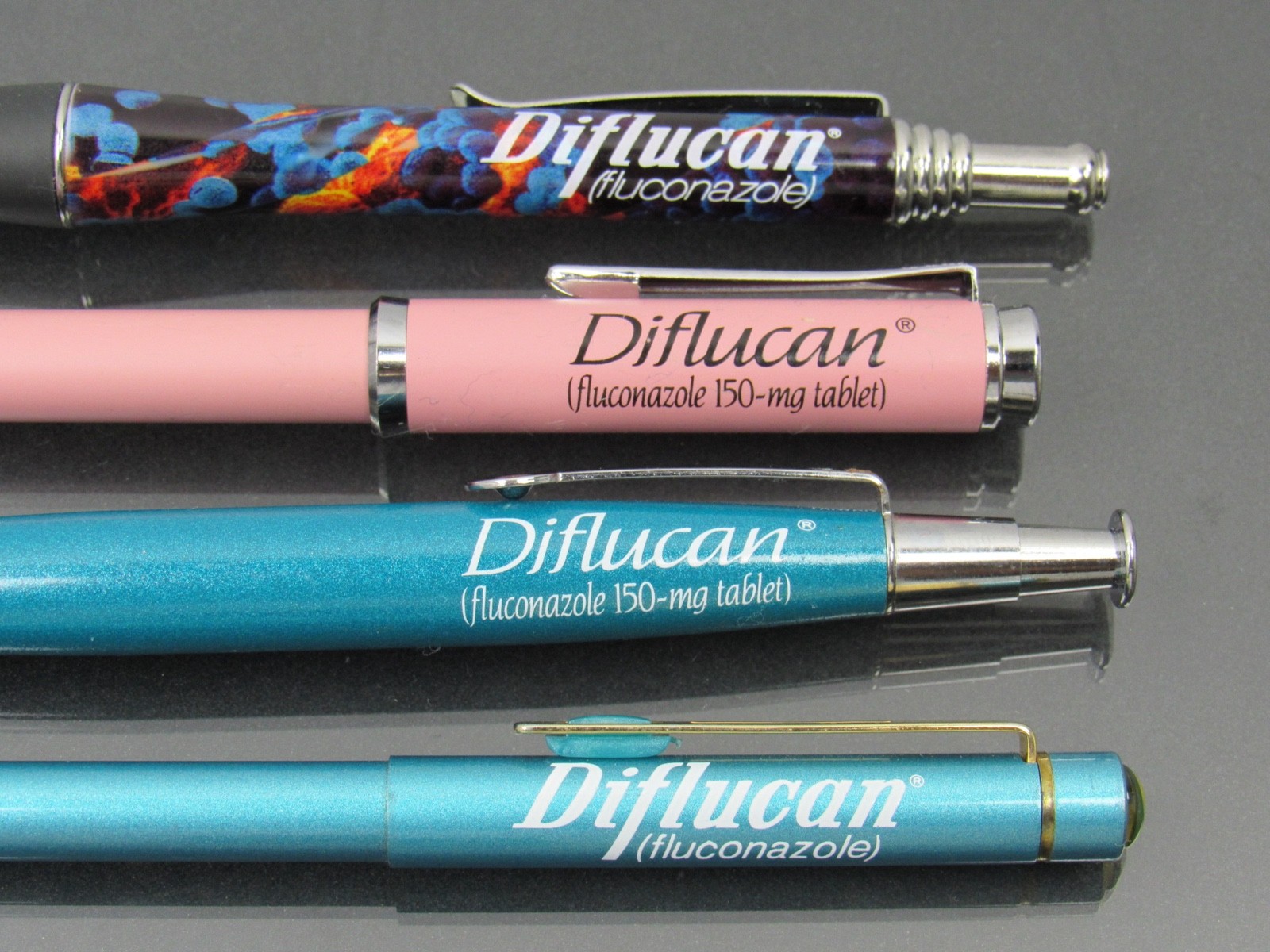 Diflucan Metal PENS Lot Drug Rep Pharmaceutical Promo Fungus Design Pink & Teal