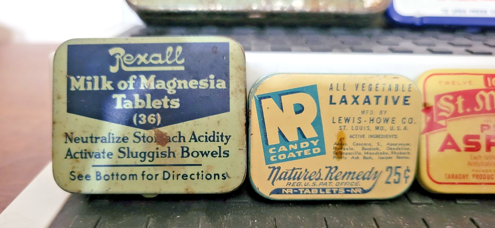 Vintage -Unique- 9 medicine advertising tins Rexall, Fixaco, Laymon’s +6