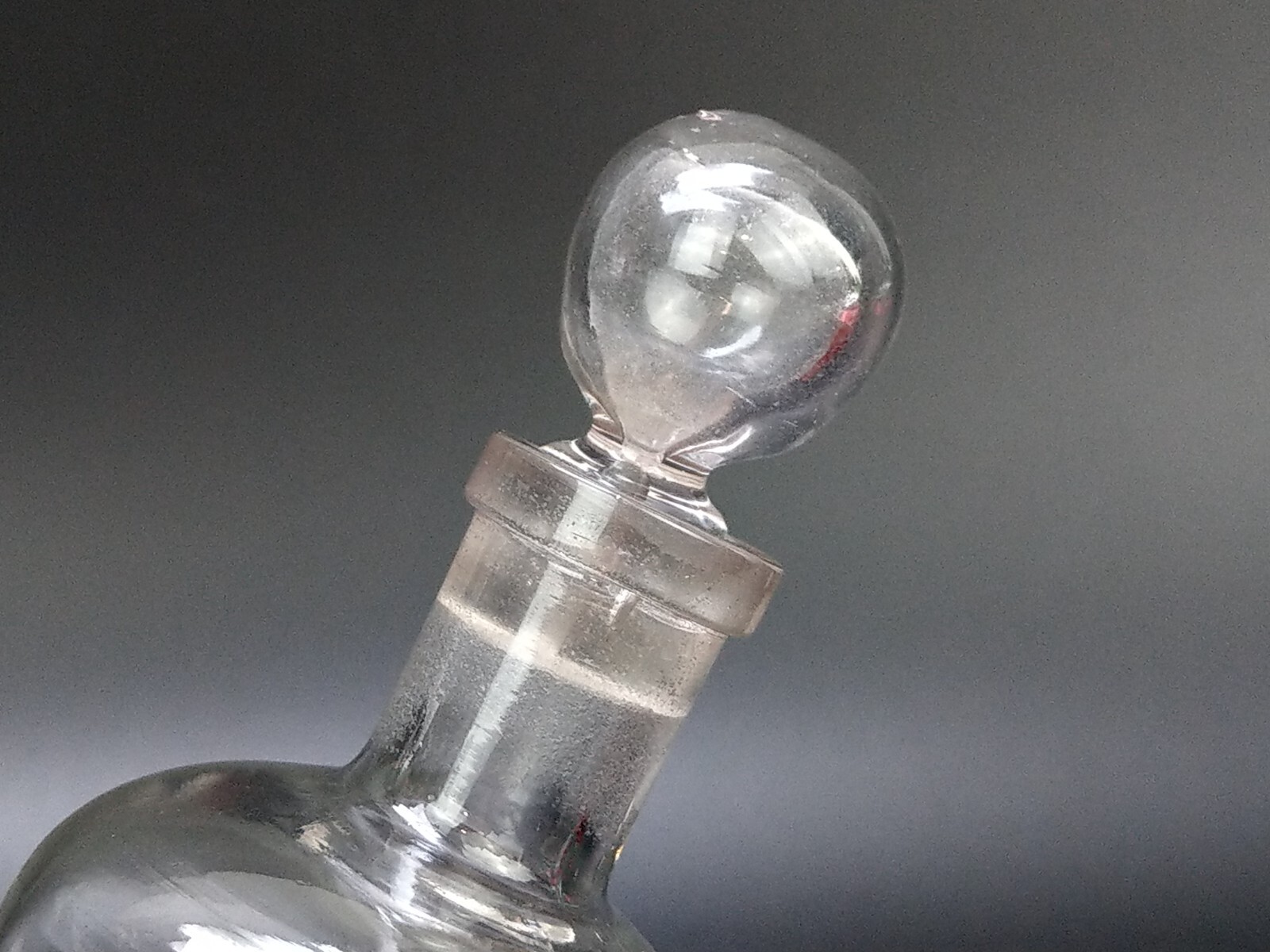 Antique clear medicine bottle with stopper medium size