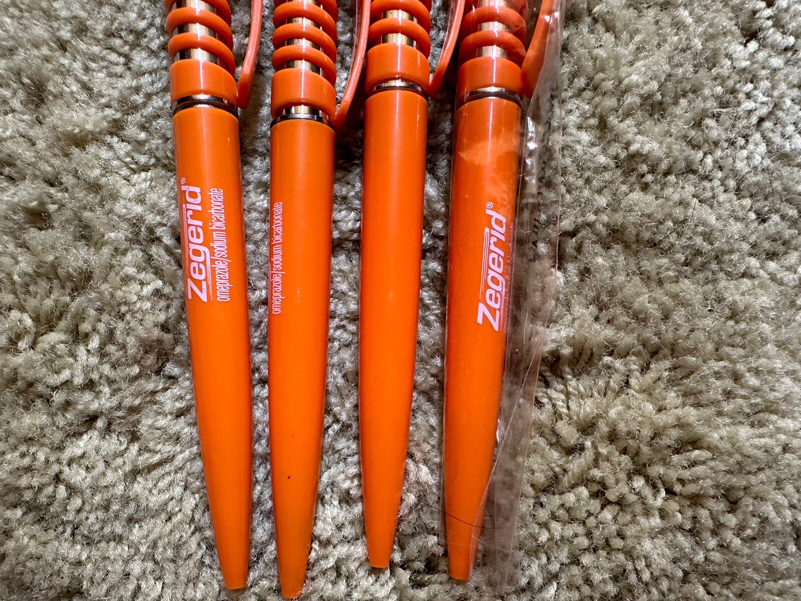 Orange Zegerid Drug Rep Pharmaceutical Promo Pens Spring Coil Clicker Lot of 4