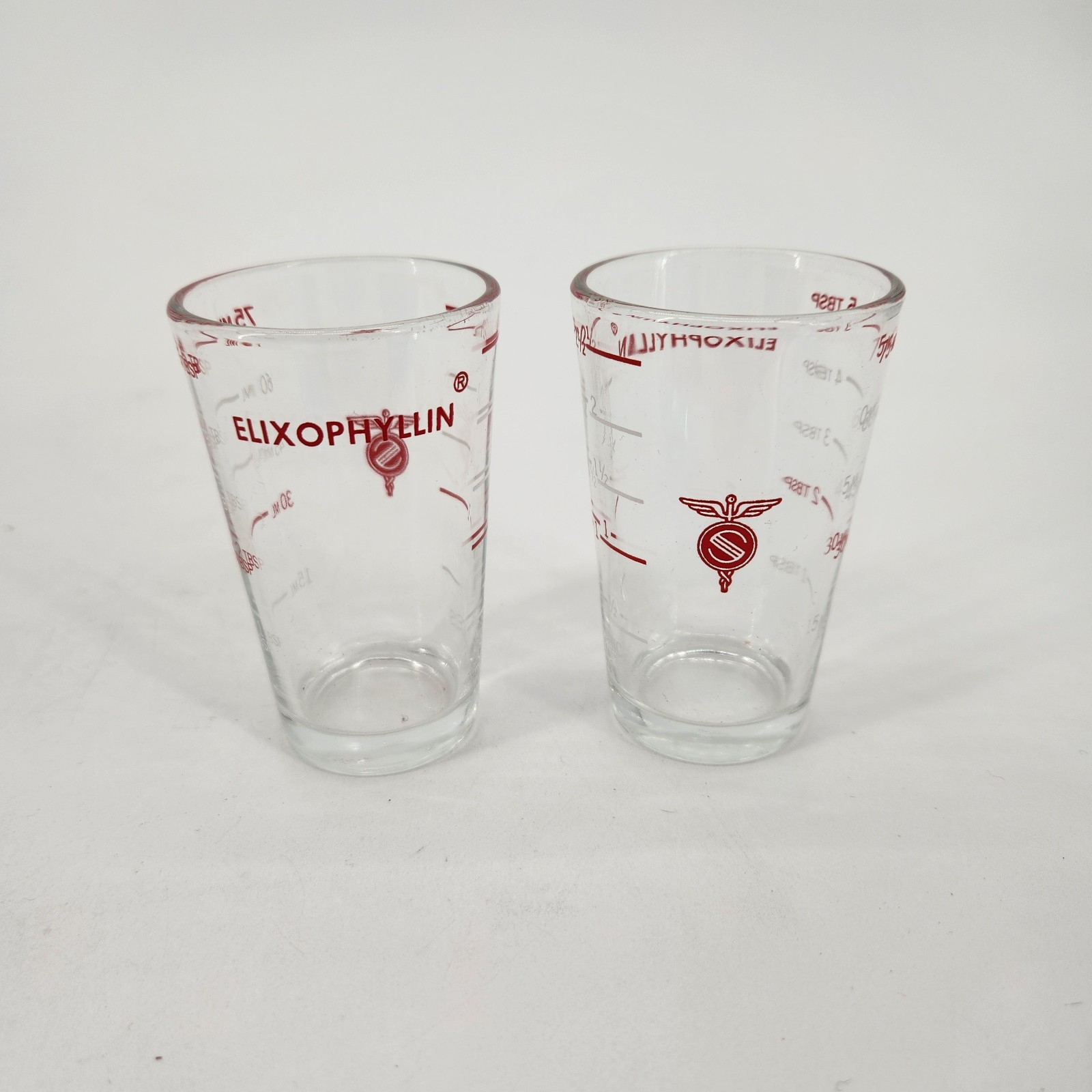 Set Of 2 Elixophyllin Measuring Glass Tablespoons Premium Advertising