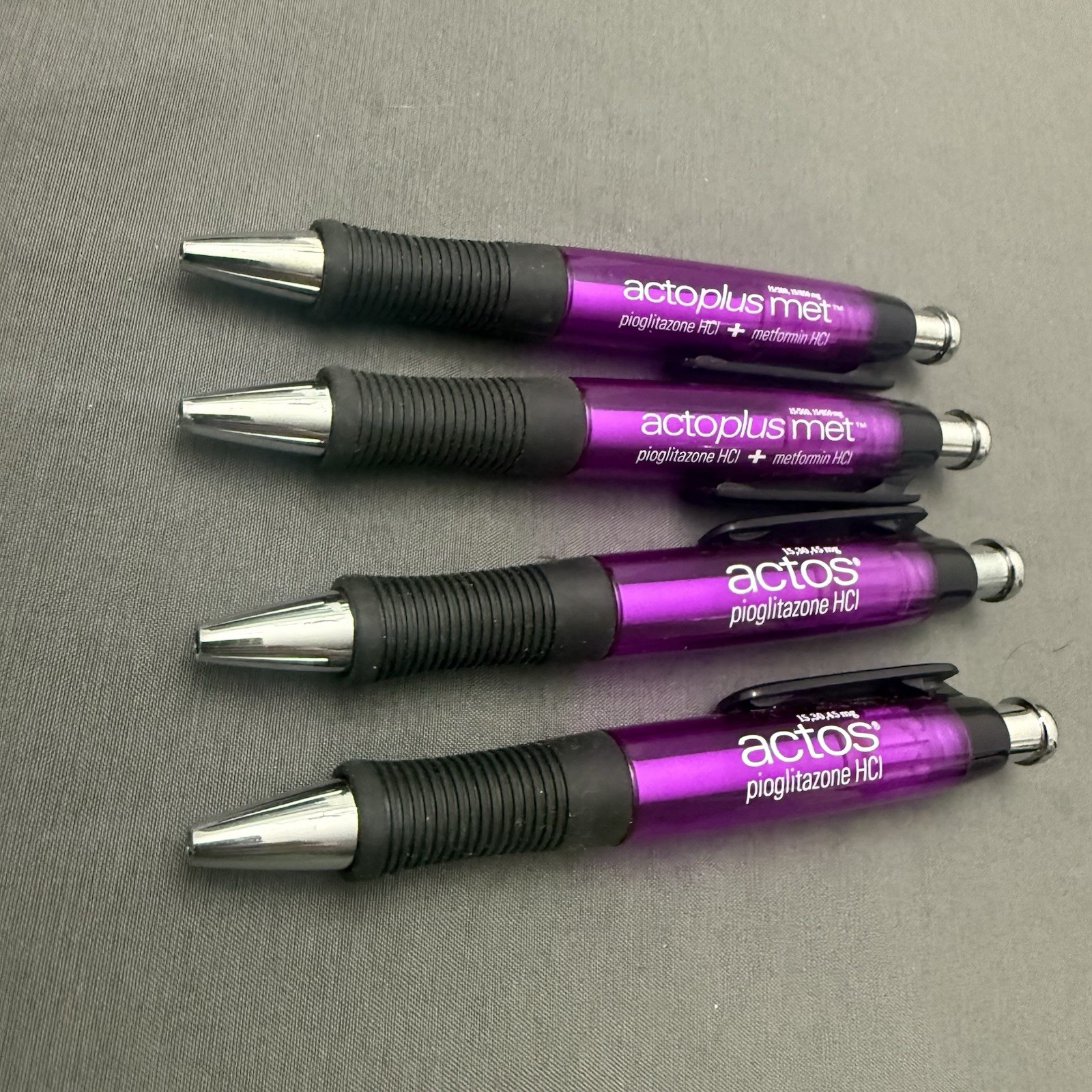 Lot of 4 Purple Pharmaceutical Promo Pens Actos Actoplus Met Rubber Grip Click