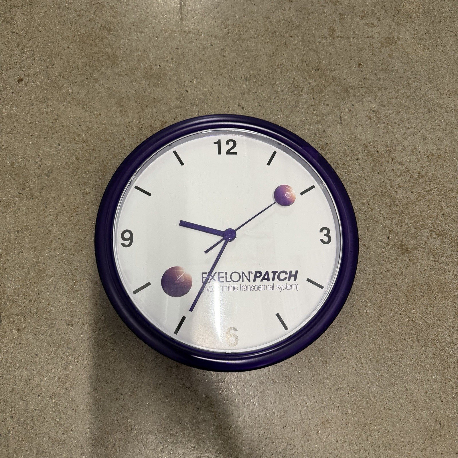 Exelon Patch Pharmaceutical Advertising Purple Wall Clock 10″ Plastic