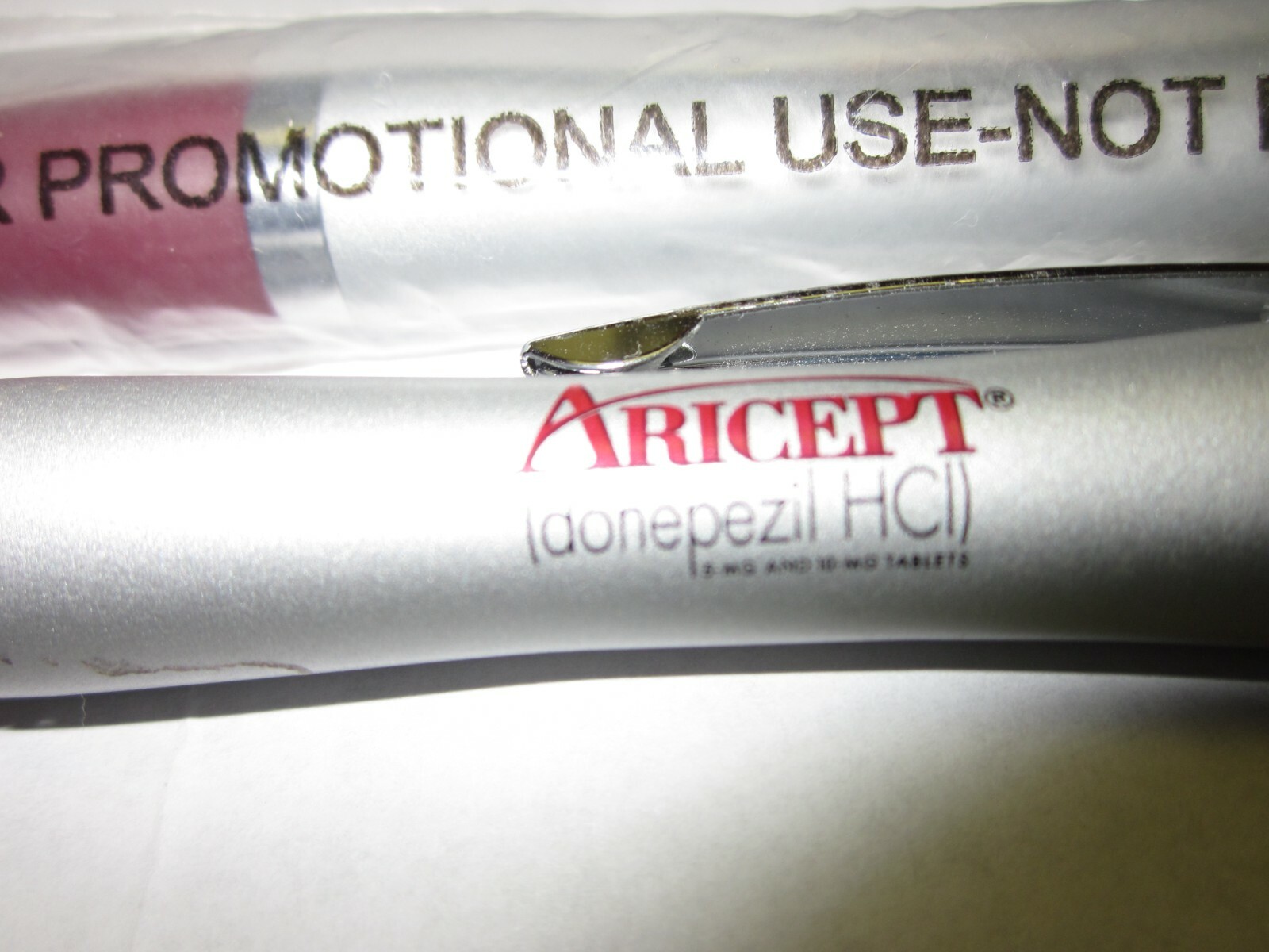 LOT OF 2 BRAND NEW PHARM. DRUG REP PENS- ARICEPT, HEAVY METAL, CLICKER,