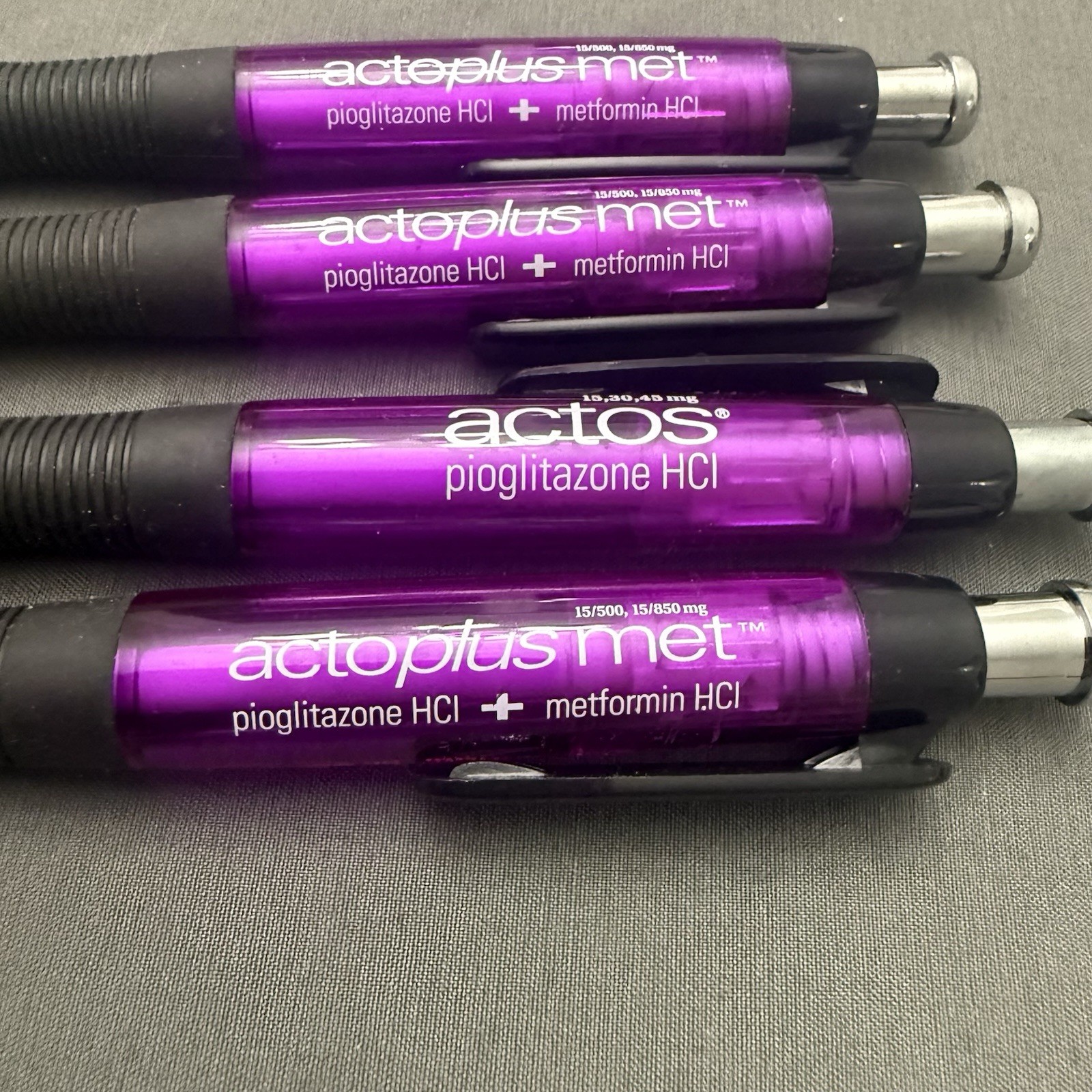 Lot of 4 Purple Pharmaceutical Promo Pens Actos Actoplus Met Rubber Grip Click