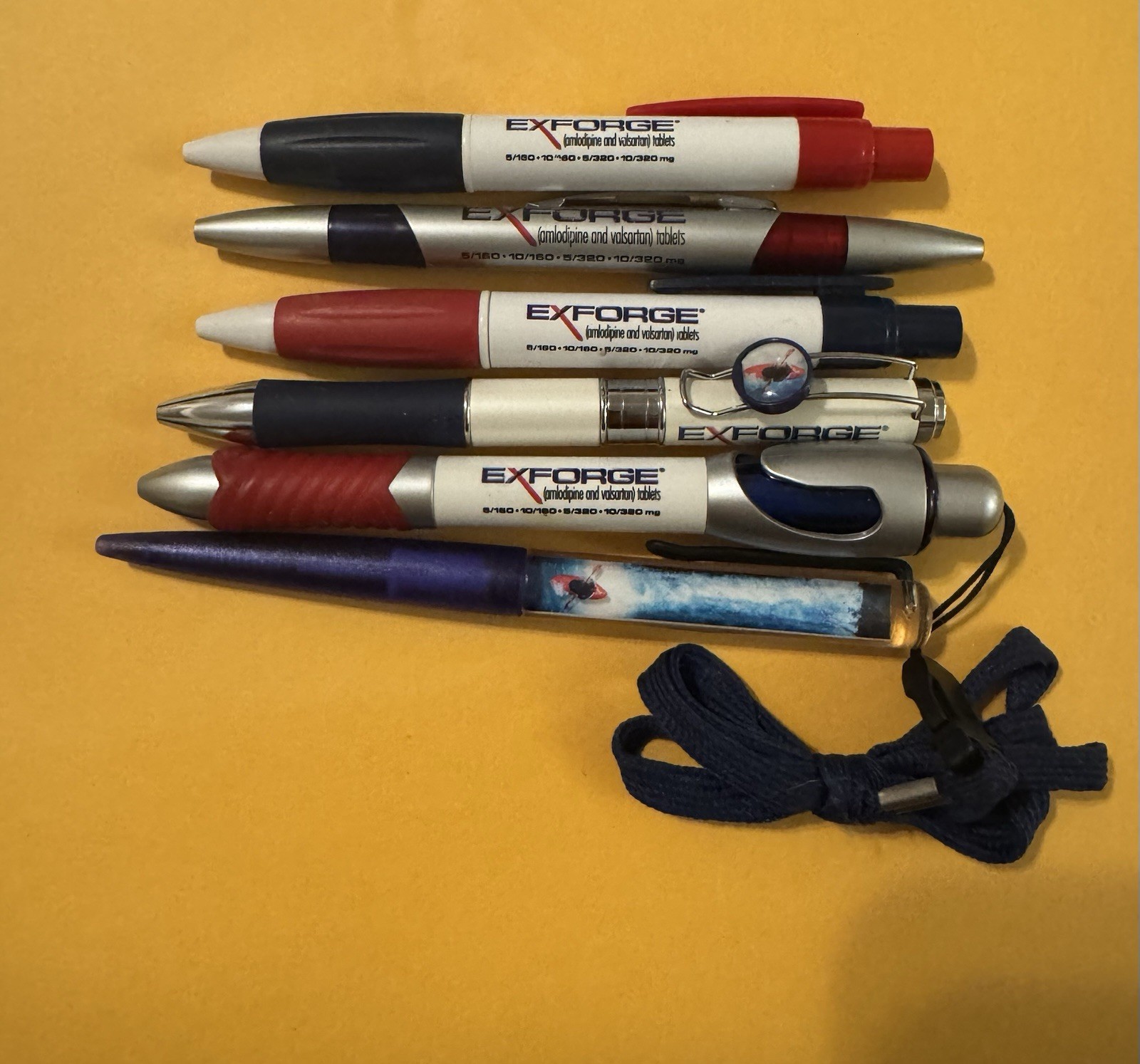 Exforge Lot of 6 Promotional Plastic Ballpoint Pens, Assorted Colors w/ Lanyard